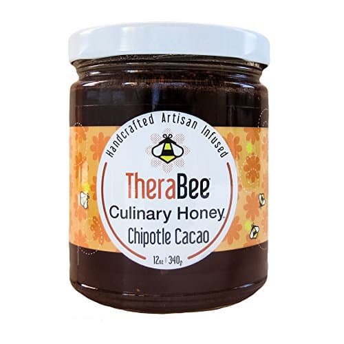 TheraBee Chipotle Cacao Culinary Honey. Made with 100% pure, raw, unheated, unfiltered, USA honey. Handcrafted and infused with organic chipotles dehydrated and smoked over cherry wood, organic cacao beans and madagascar vanilla beans. Spicy ans d tasty aa BBQ Glaze, drizzled warm brownies, in salad dressings or straight out of the jar. 100% Natural. Gluten Free. Beautiful and unique gift idea for the foodie on your list.